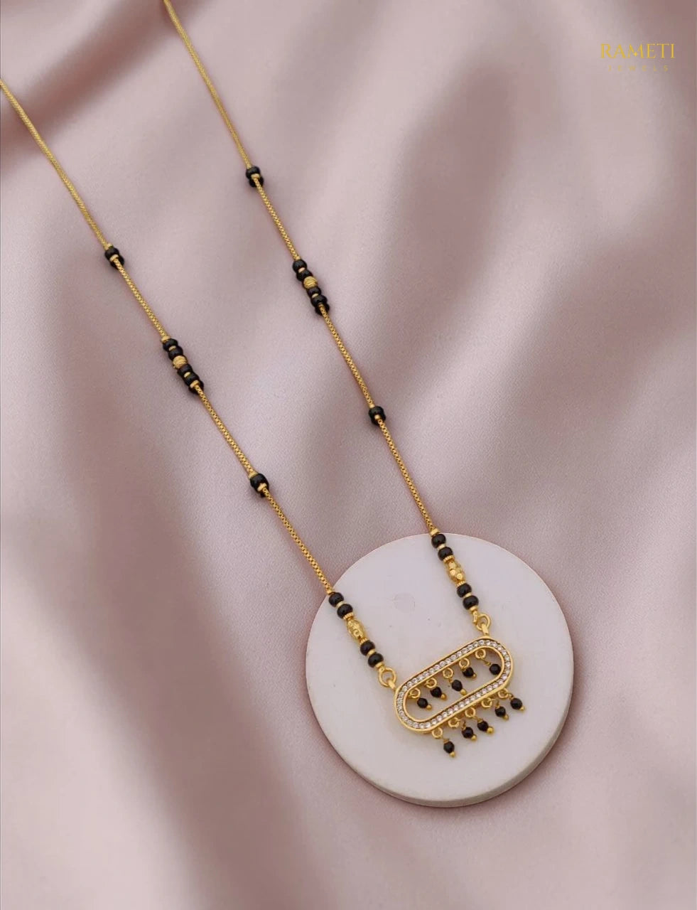 Side profile and craftsmanship of Jhalak Royal Heart Cut Designer Mangalsutra - Rameti Jewels