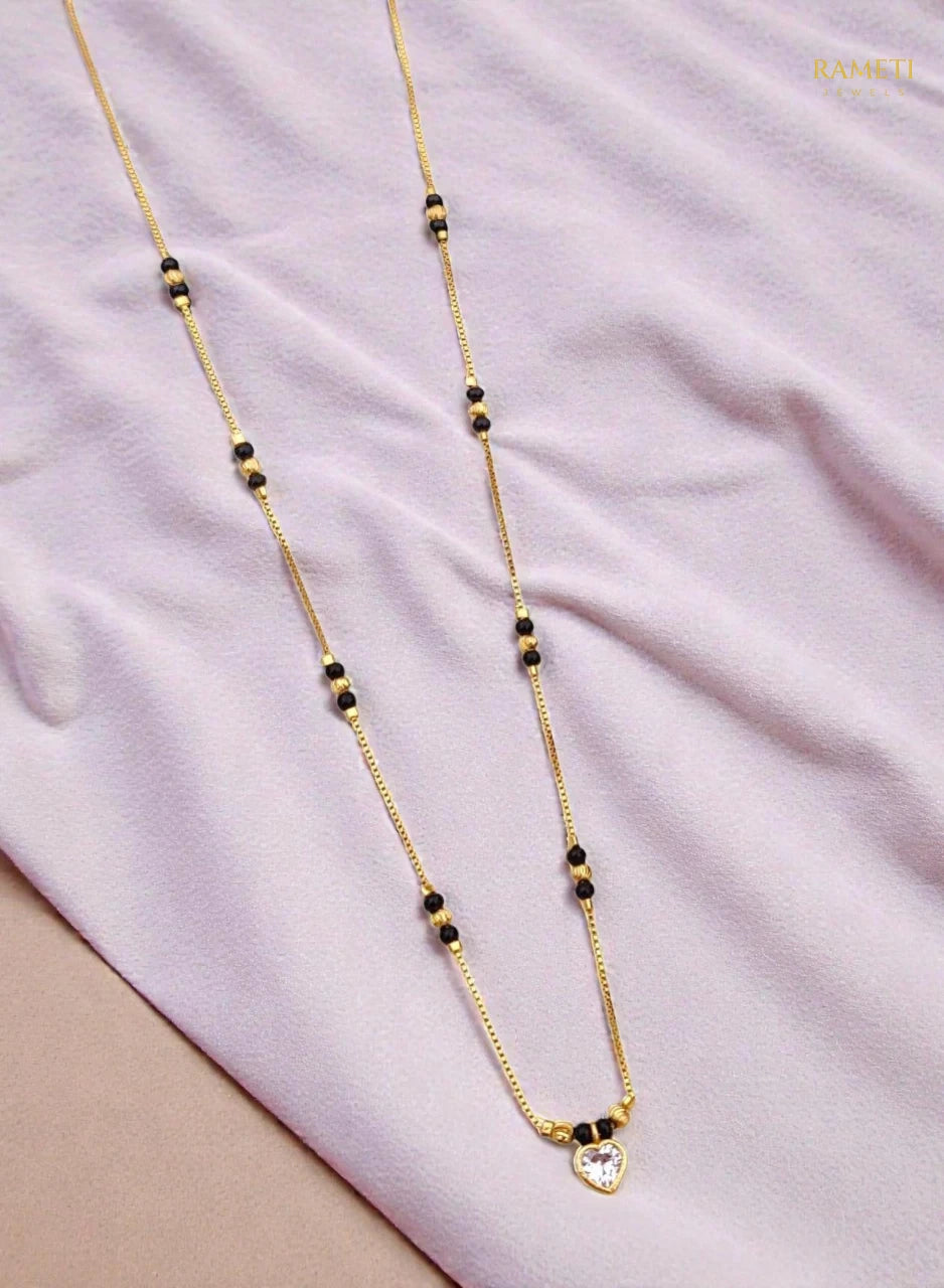 Side profile and craftsmanship of Omka Glistening CZ Studded Party Wear Mangalsutra - Rameti Jewels