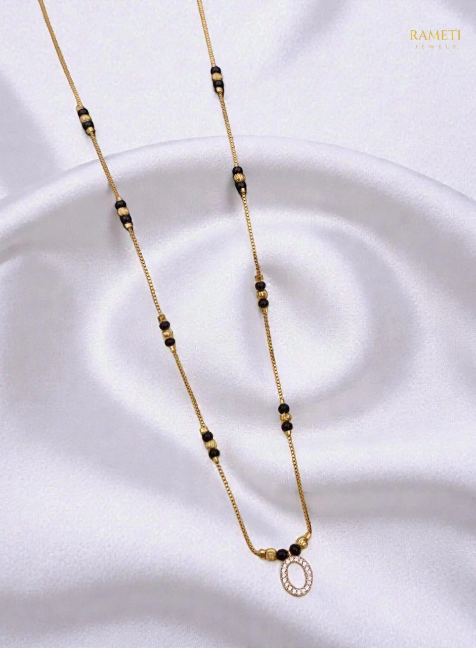 Side profile and craftsmanship of Tapi Glistening CZ Studded Party Wear Mangalsutra - Rameti Jewels