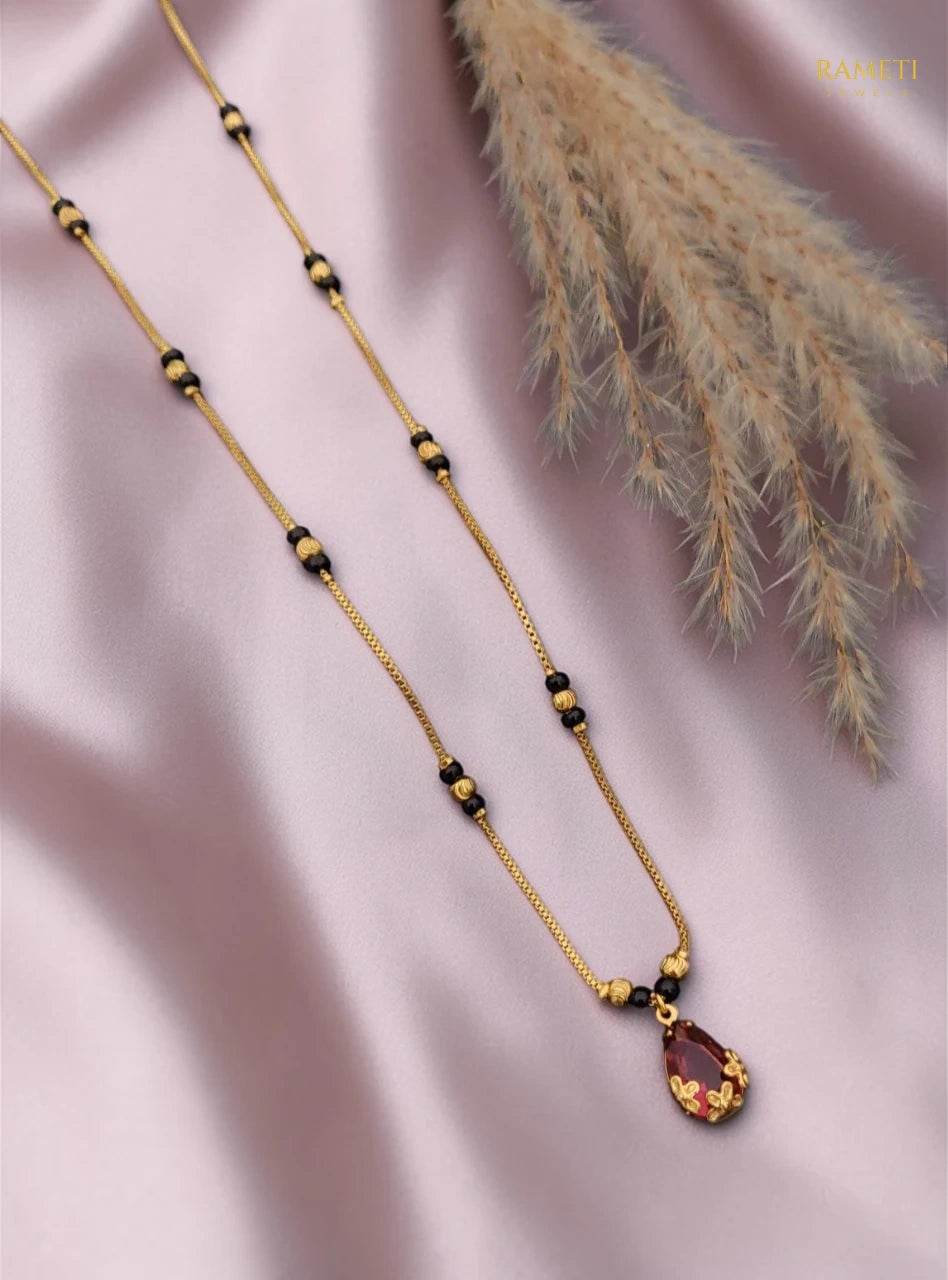Side profile and craftsmanship of Feral Eternal Bond 18K Gold Mangalsutra - Rameti Jewels