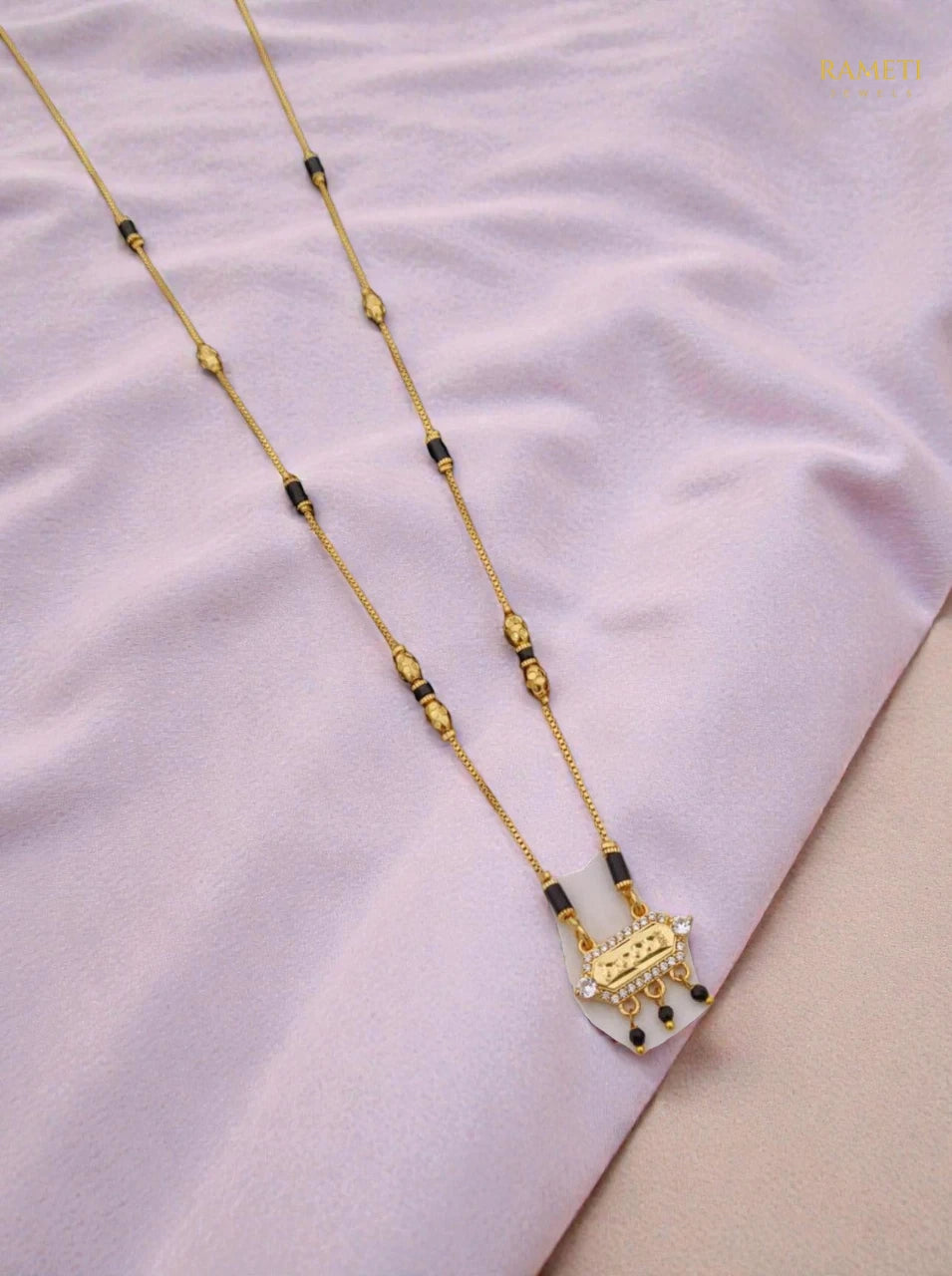 Side profile and craftsmanship of Kamini Divine Protection Classic Mangalsutra - Rameti Jewels