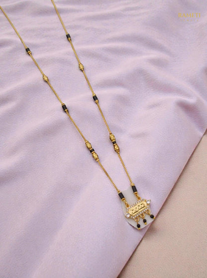Side profile and craftsmanship of Kamini Divine Protection Classic Mangalsutra - Rameti Jewels