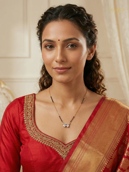 Mahi Royal Heart Cut Designer Mangalsutra worn by model - Rameti Jewels