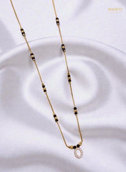 Side profile and craftsmanship of Tapi Glistening CZ Studded Party Wear Mangalsutra - Rameti Jewels