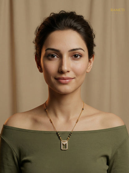 Urvi Royal Heart Cut Designer Mangalsutra worn by model - Rameti Jewels