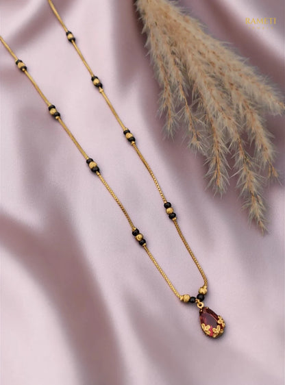 Side profile and craftsmanship of Feral Eternal Bond 18K Gold Mangalsutra - Rameti Jewels