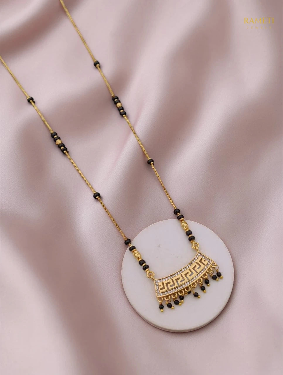 Side profile and craftsmanship of Jayna Glistening CZ Studded Party Wear Mangalsutra - Rameti Jewels